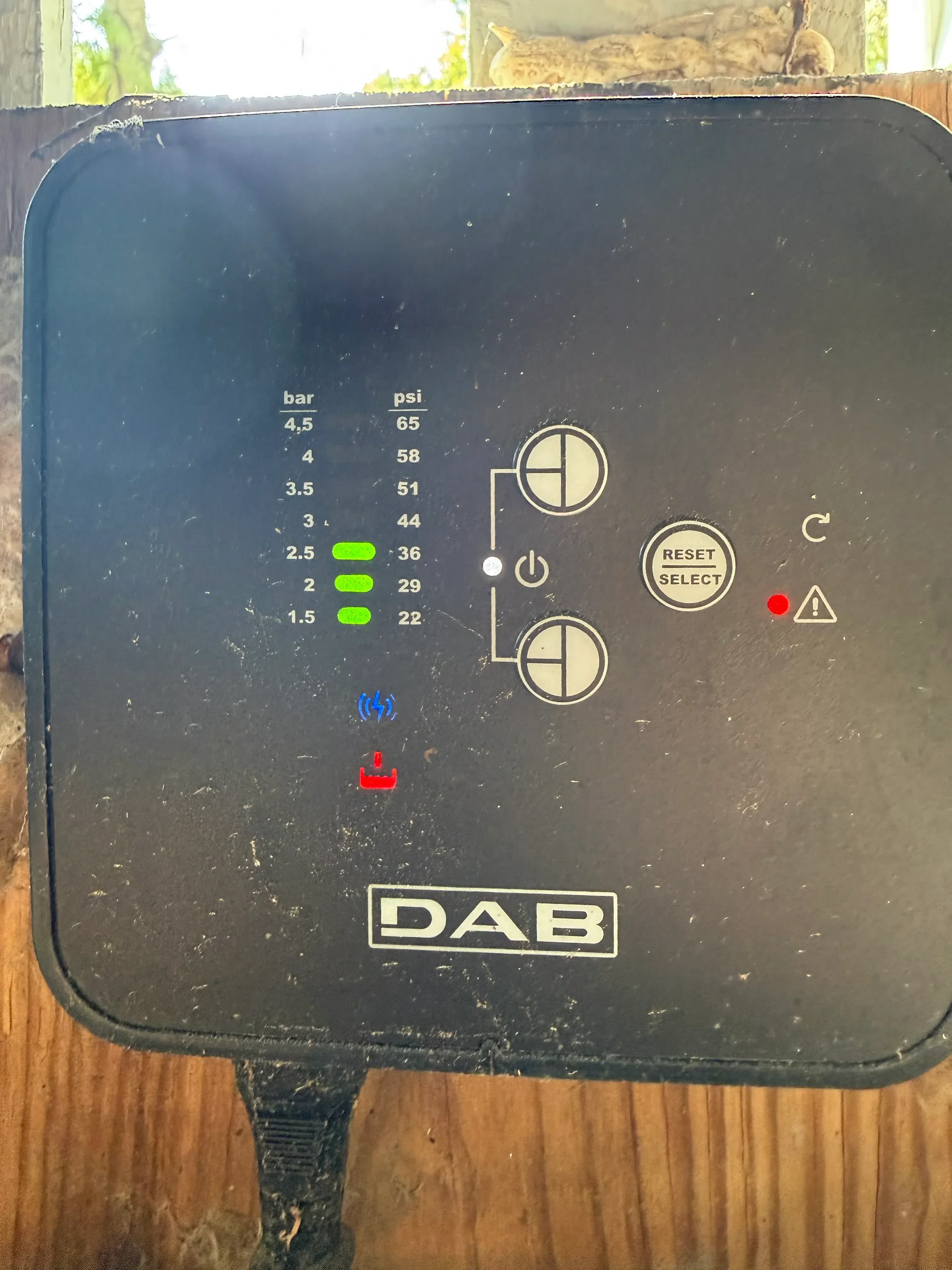 DAB water pressure tank with dual gauges, pressure relief valve, and control indicators installed